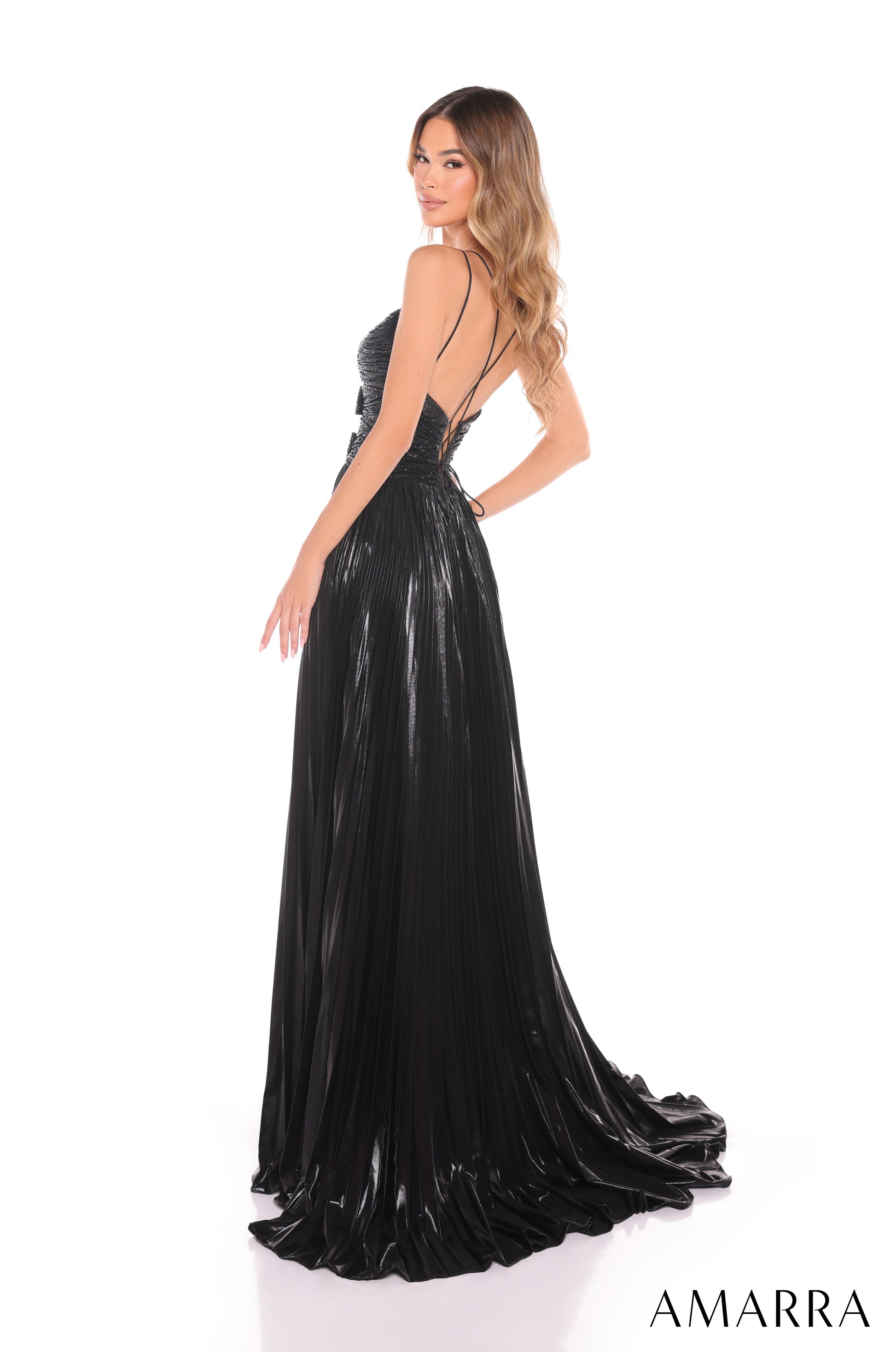 Elevate your prom look with the Amarra 88435 Metallic Pleated Bow Cut Out Prom Dress. The elegant A Line gown features a stylish slit and a corset back for a flattering fit. The metallic pleated bow adds a touch of glamour to this formal dress. Perfect for making a statement at any formal event. Step into spring with a stunning A-line dress that radiates elegance and charm. Crafted from sleek taffeta, this sleeveless beauty features a flattering V-neck and a floor-length silhouette that adds a touch of glam