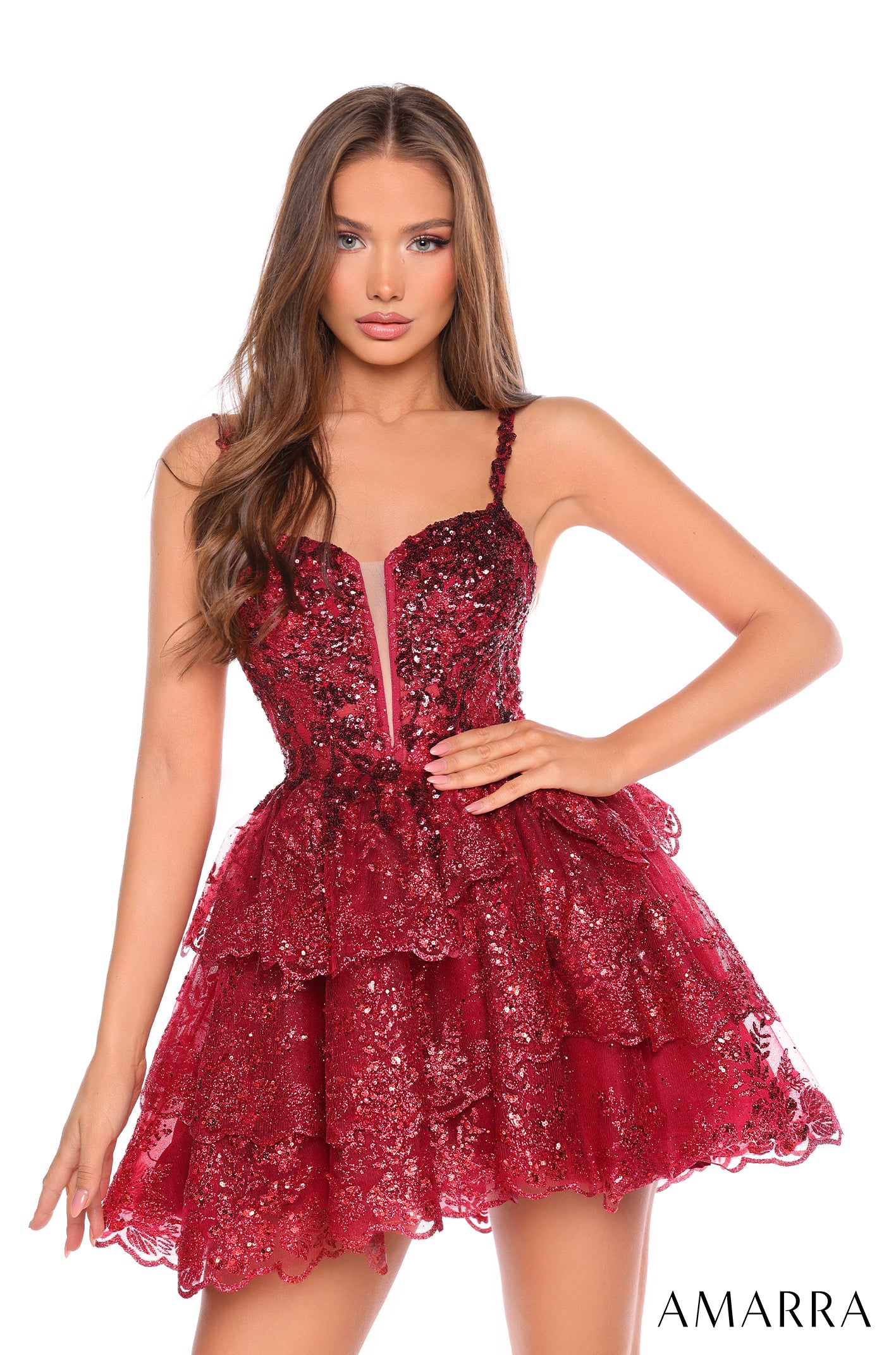 Be Ready to Shine in the Amarra 88705! This short, sassy corset dress features a dazzling array of sequins and a chic asymmetrical ruffle hem that will have everyone drooling. With its luxurious lace and v-neck cut, this show-stopping gown is perfect for homecoming, prom and any night out on the town! Get your shine on, girl!