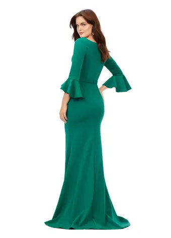 Ashley Lauren 11325 Crew Neck Three Quarter Flutter Sleeves Ruched Skirt Fitted Gown. This timeless and elegent evening gown features flutter three quarter sleeves. The skirt is adorned with ruching and finished with a sweep train.