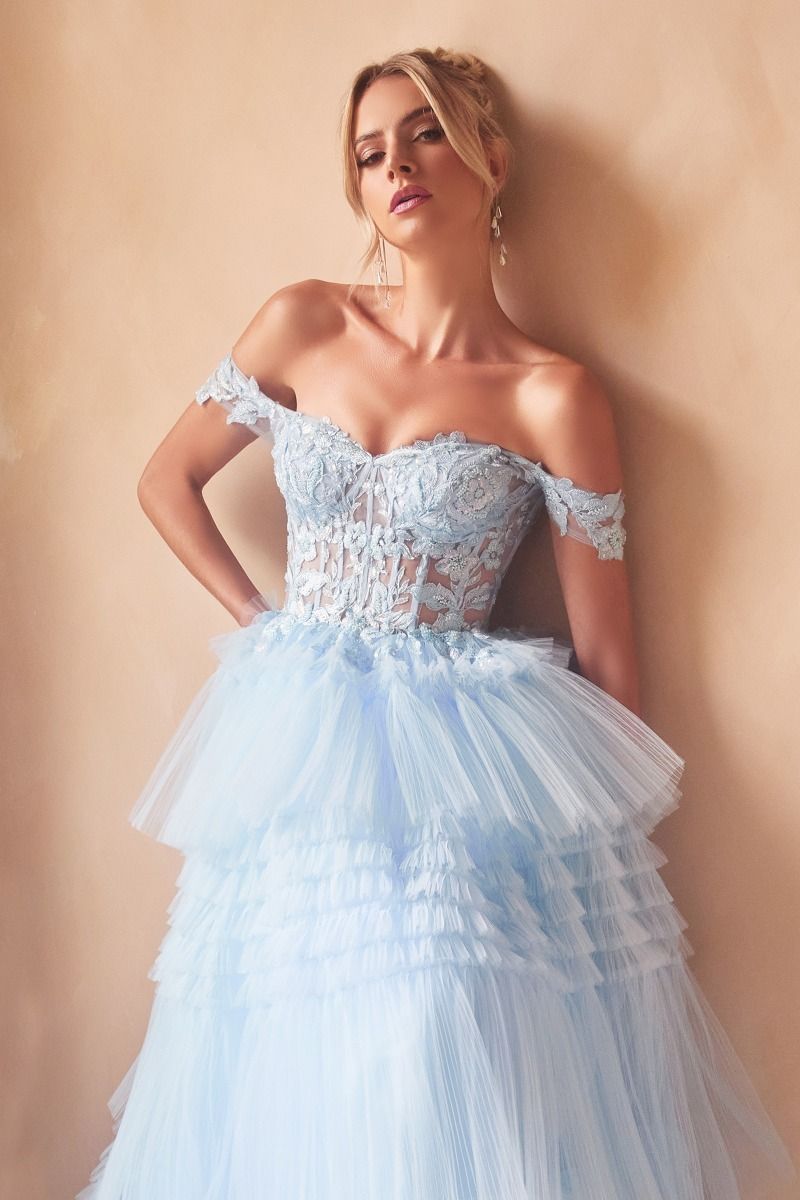 Indulge in the opulence of Ladivine's 9315 Long Layered Tulle Ballgown. The stunning sheer lace corset and off-the-shoulder design exude elegance, while the layered tulle adds volume and movement. Perfect for prom or any formal event, this dress will make you feel like a princess. Let your fairytale dreams come true with this exquisite layered pleated tulle ball gown!