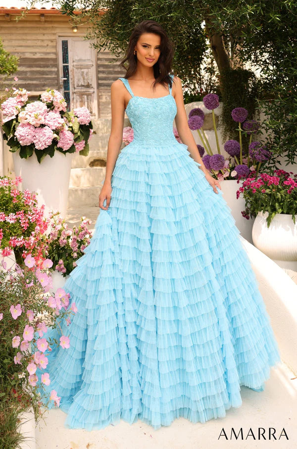 Amarra 94026 Romance and charm are embellished in this elegantly beautiful dress that is guaranteed to make your prom night feel like a fairy tale. Made with beguiling layered tulle material that cascades in breathtaking gathers, the dress exudes glamor. The bodice is adorned with rhinestone detail, an off the shoulder neckline, a sexy low-cut back and detachable bardot sleeves that add to the gorgeous appeal.