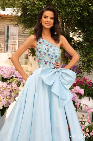 Amarra 94041 This dress is the pure definition of go big or go home, or in this case, go big at prom or stay home. The fitted bodice with one shoulder is splendidly resplendent with rhinestone crystals of various intriguing colors - blue, red, light yellow, green, orange - beaded into the linen. This dazzling bodice seamlessly transitions into a silken tulle skirt that flows down the floor in one graceful wave and a big gorgeous bow sits on the waistline, accentuating the glamorous look.