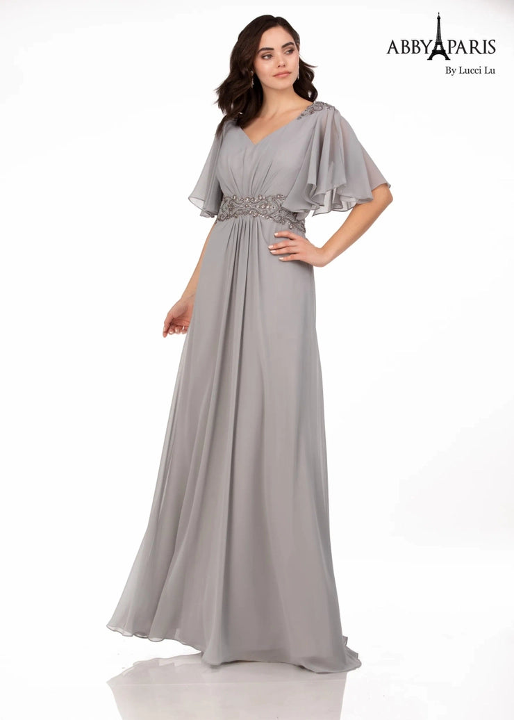 Abby Paris 986002W A-Line Pleated Crystal Detail Drape Sleeves V-Neck Plus Size MOB Gown. The Abby Paris 986002W Plus Size MOB Gown offers timeless elegance. With its a-line silhouette, crystal detailing, v-neckline and pleated chiffon drape sleeves, this gown is perfect for special occasions. The high-quality construction includes a hidden back zipper and satin lining for added comfort.