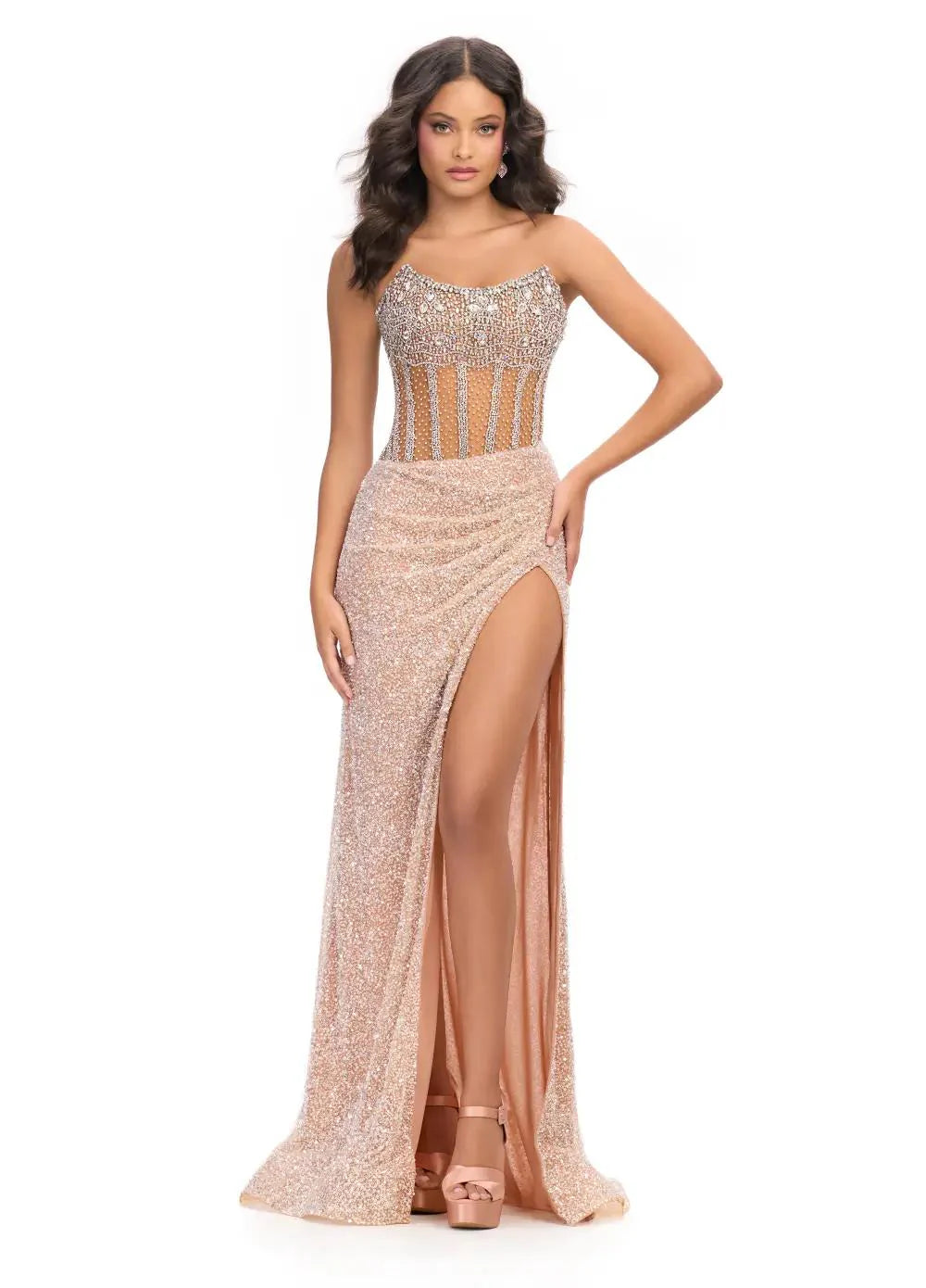 ASHLEYlauren 11830 Beaded Evening Gown Prom Dress Scoop Neckline wrap skirt. Dazzle in this fully beaded gown. The sweetheart neckline is complete with a corset bustier. The skirt is finished with horsehair and a left leg slit.
Sweetheart Neckline
Corset Bustier
Left Leg Slit
Fully Hand Beaded