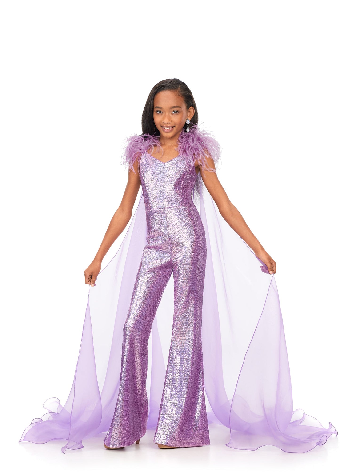 Ashley Lauren Kids 8174 Girls Sequin Jumpsuit with Organza Cape  Bring the drama in this kids sequin jumpsuit featuring a v-neckline. The look is complelted with an off the shoulder feather strap and organza cape.