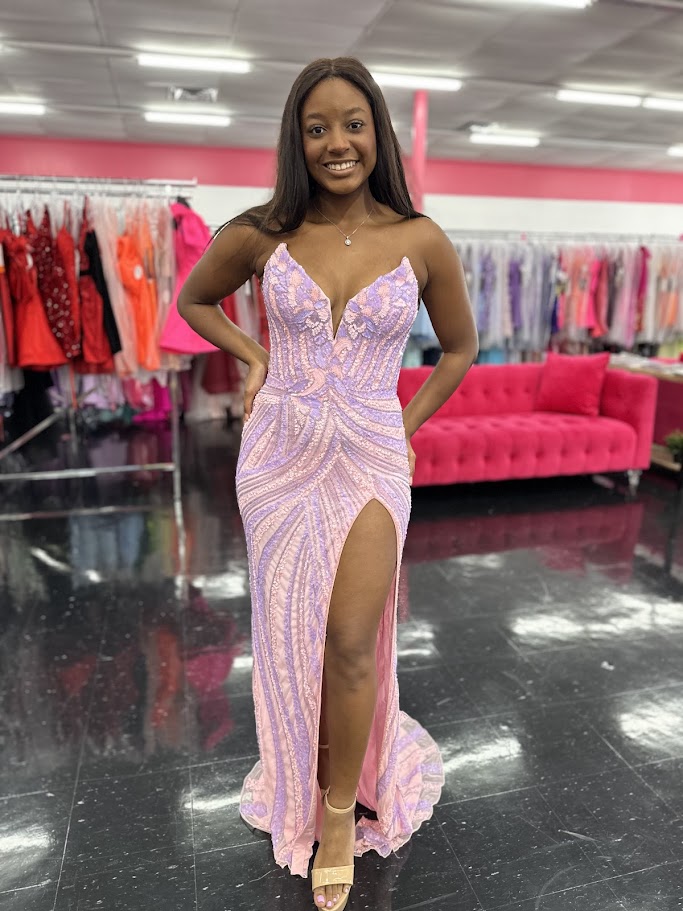 Ashley Lauren 11236 Long Fitted V Neck Slit Beaded Sequin Prom Dress Pageant Gown This strapless gown is sure to turn heads. The sweetheart neckline is complete with a modern floral sequin motif that continues down the bustier and skirt. The skirt is complete with a left leg slit.