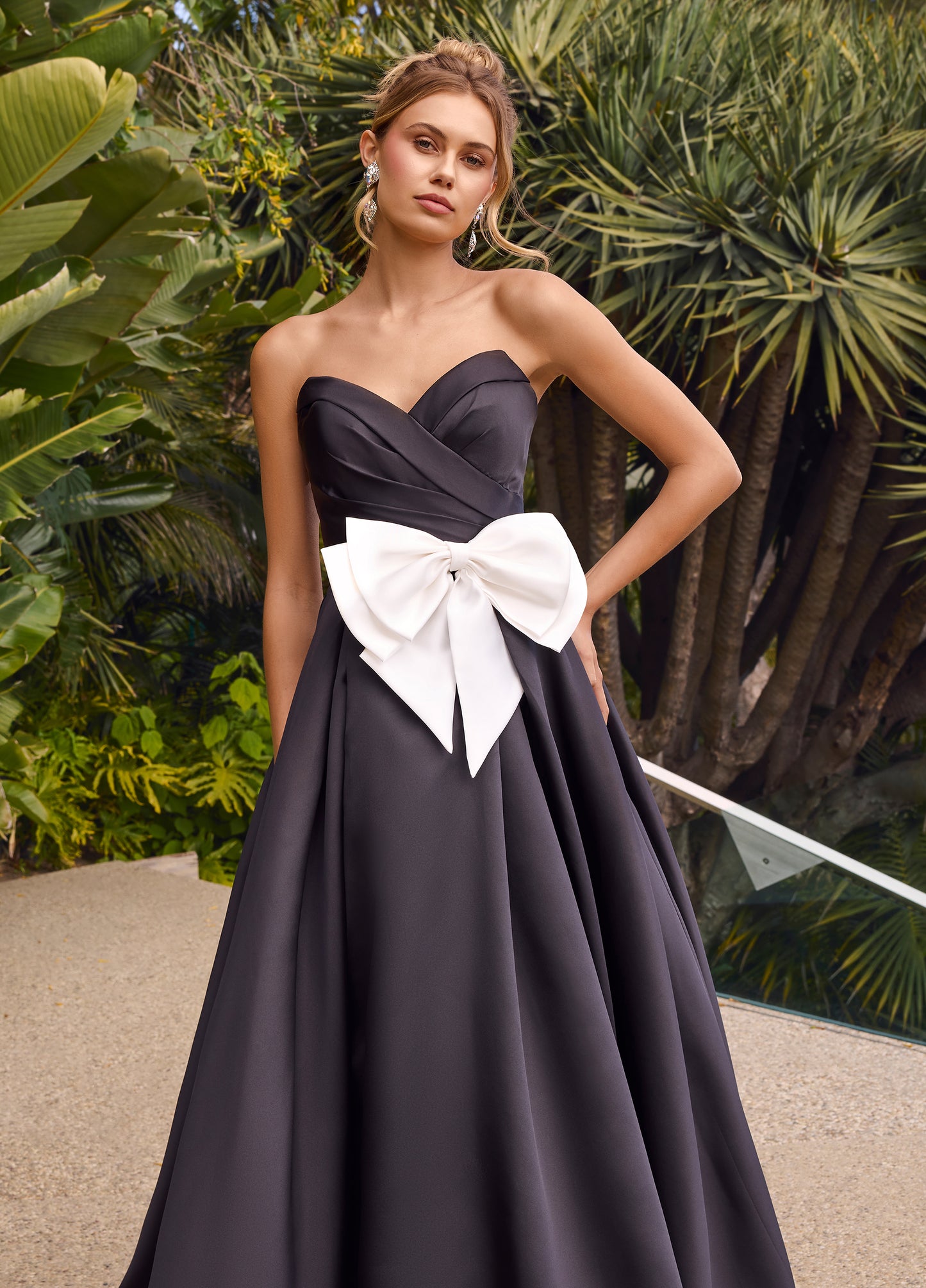 Expertly designed by Ashley Lauren, style 11770 strapless ballgown features a beautiful bow detail and sweetheart neckline. The perfect combination of elegance and style, this dress is a must-have for any formal occasion. Crafted with precision and attention to detail, it's sure to make you stand out.