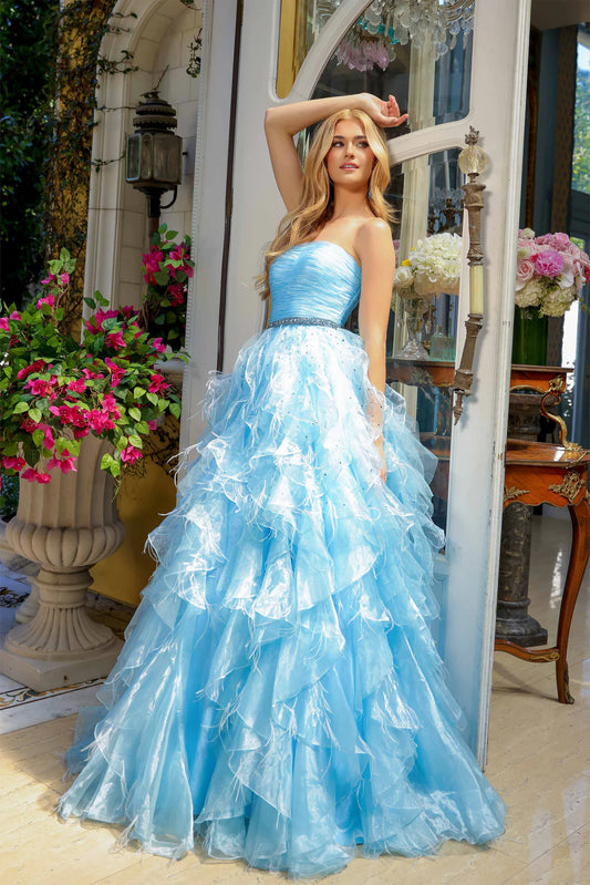 Elevate your formal attire with the Ava Presley 39555 Ballgown. This luxurious dress boasts a long feather ruffle and a strapless design, exuding elegance and style. Perfect for prom or pageants, this exclusive dress will make you feel like a true fashion icon. Float down the runway in this ethereal strapless ball gown, featuring a ruched bodice and cascading ruffle skirt that brings volume and drama. The cinched waist, adorned with a sparkling belt, adds a touch of glamour to this stunning look. Perfect fo