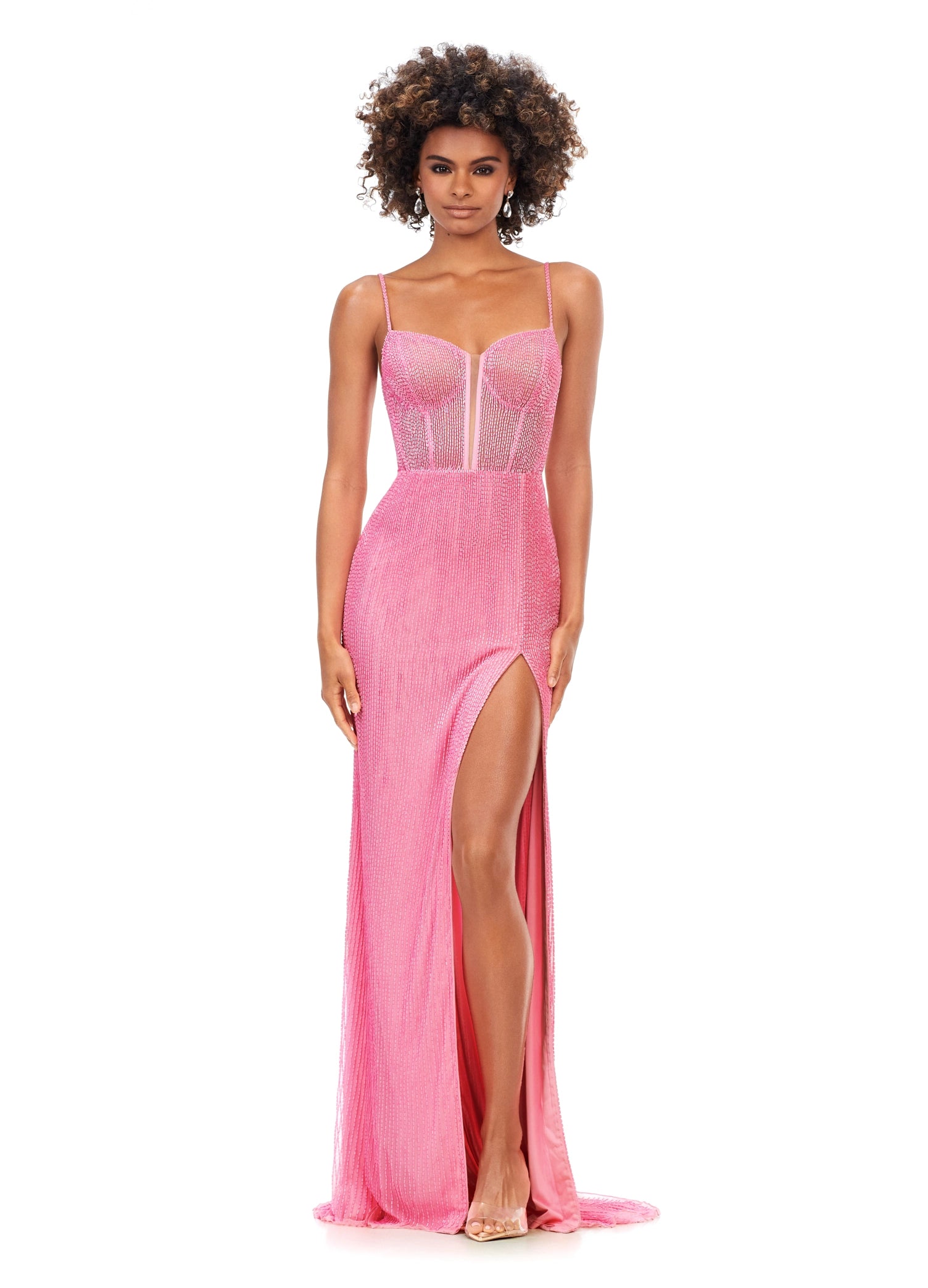 Ashley Lauren 11369&nbsp;This liquid beaded style features an exposed bustier that is sure to accentuate your curves. The look is complete with sweep train and left leg slit.