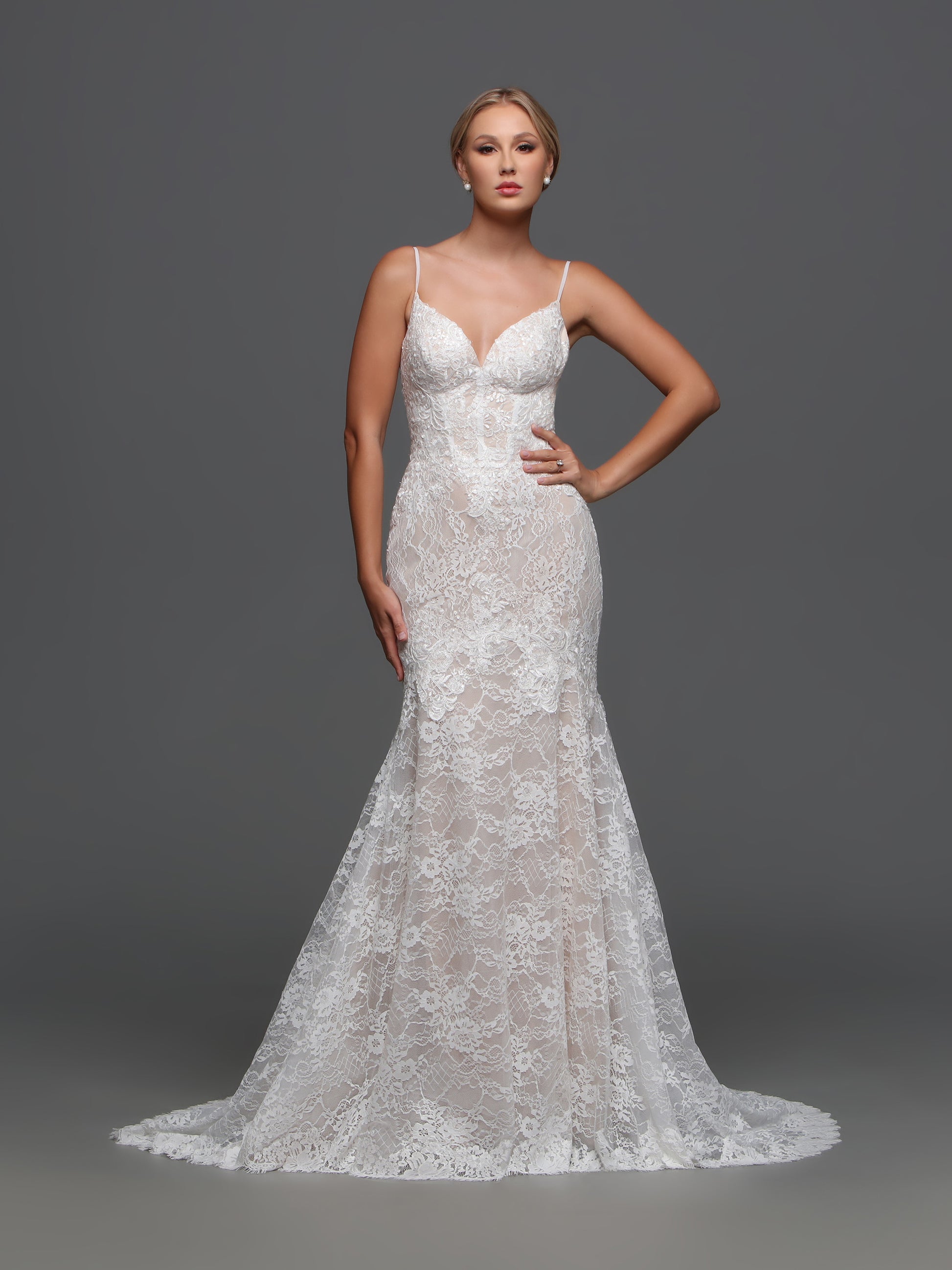 Indulge in pure elegance with the Davinci F122 Sequin Lace Mermaid Wedding Dress. This stunning bridal gown features intricate sequin lace detailing, a sweeping train, and a sheer corset for a truly sophisticated and refined look. Make a statement on your special day with this exclusive, luxury dress. A mermaid-style wedding dress with a sweet vibe, this all-lace design has a sheer bodice and a modified mermaid skirt that’s easy to move around in.