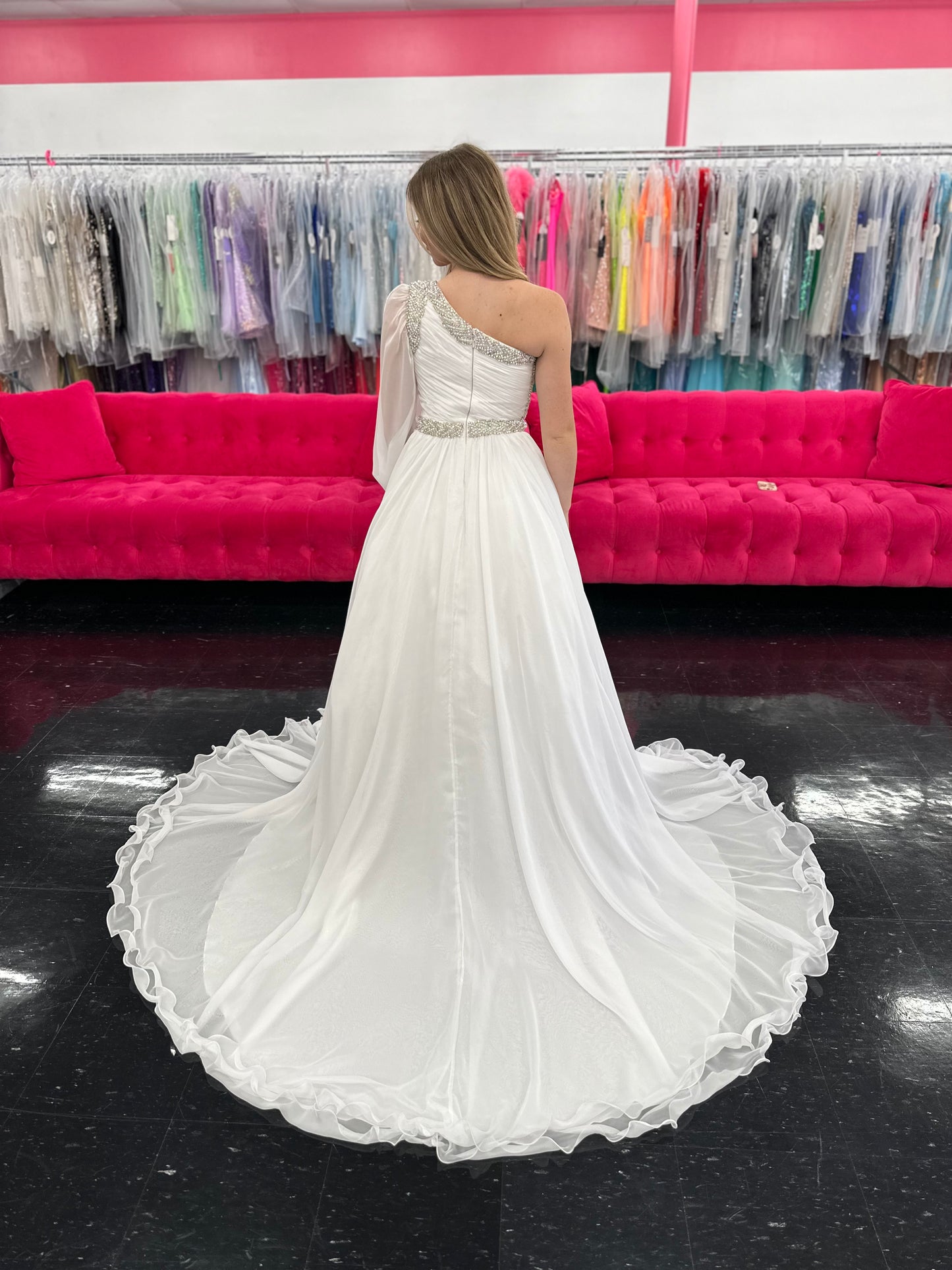 Be the epitome of grace and elegance in the Samantha Blake 1014 one shoulder Long Sleeve Pageant Dress. Made with delicate chiffon and a stunning crystal embellished bodice, this dress features a one-shoulder design and long sleeves for a sophisticated look. Perfect for any pageant or formal event.