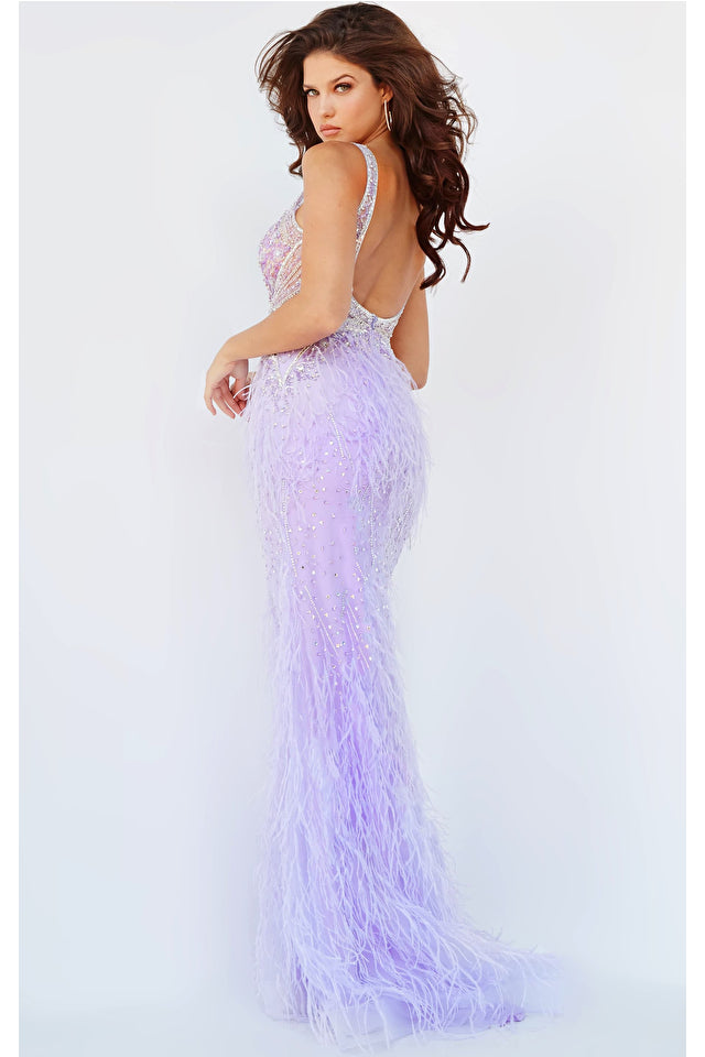 Jovani 03023 is a Long Feather Skirt Prom Dress, Pageant Gown, Wedding Dress & Formal Evening wear. This Sheer embellished bodice features a plunging v neckline with beading & crystal accents cascading through a feather embellished skirt. Very stunning and unique wedding dress!