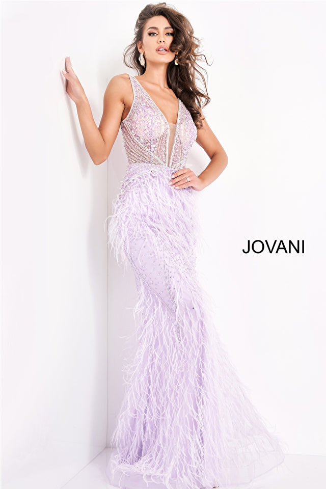 Jovani 03023 is a Long Feather Skirt Prom Dress, Pageant Gown, Wedding Dress & Formal Evening wear. This Sheer embellished bodice features a plunging v neckline with beading & crystal accents cascading through a feather embellished skirt. Very stunning and unique wedding dress!