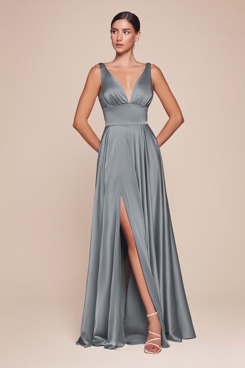 Ladivine 7469 Bridesmaids Dress is an A-line dress features a deep V-neckline and an empire waistline, beautifully crafted from soft satin. The fitted bodice transitions into a gracefully gathered skirt, creating a flattering silhouette. This best seller is ideal for bridesmaids, wedding guests, or formal events, and is both elegant and timeless.