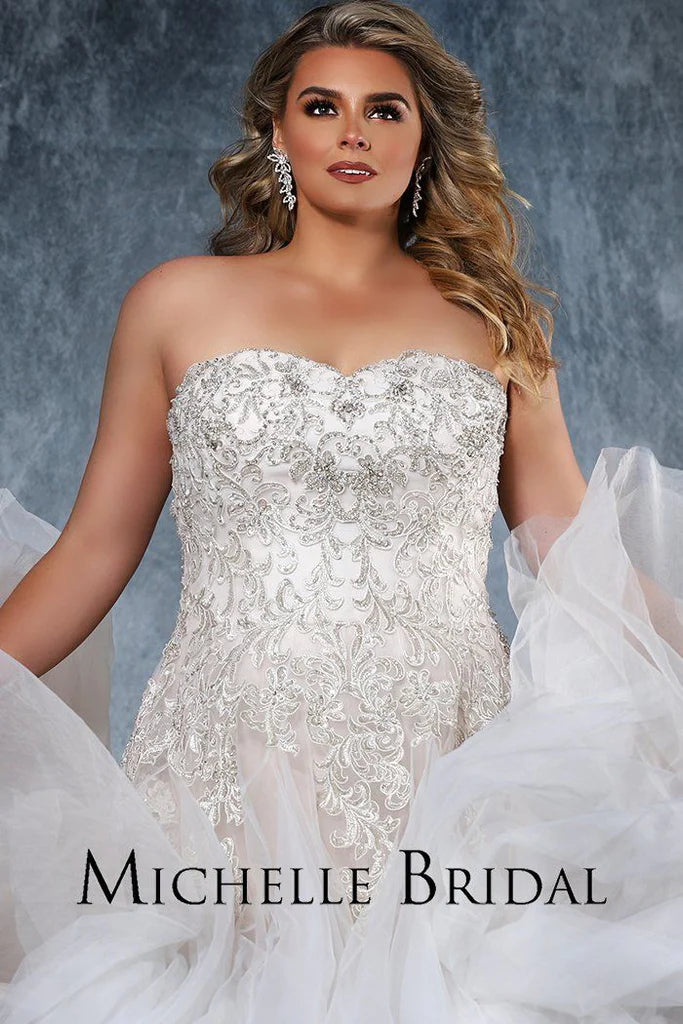 Michelle Bridal For Sydney's Closet MB1819 A-Line Sweetheart Neckline Strapless Lace Up Back Heavily Beaded Bodice Plus Size "Vanessa" Bridal Gown. Impress your guests on your special day with the luxurious Vanessa bridal gown from Michelle Bridal for Sydney's Closet. Crafted with a sweetheart neckline and a heavily beaded bodice, this strapless A-line gown also features a stylish lace-up back. Make a lasting impression in this plus size dress.