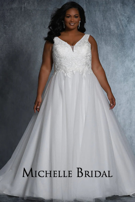 The Michelle Bridal For Sydney's Closet MB2109 Bridal Gown is a beautiful A-Line silhouette with layered tulle and sparkle tulle appliques, contemporary floral bridal lace, and a flattering V-Neck. Designed for plus size brides, this gown will make you feel like a true "Jewel" on your special day.