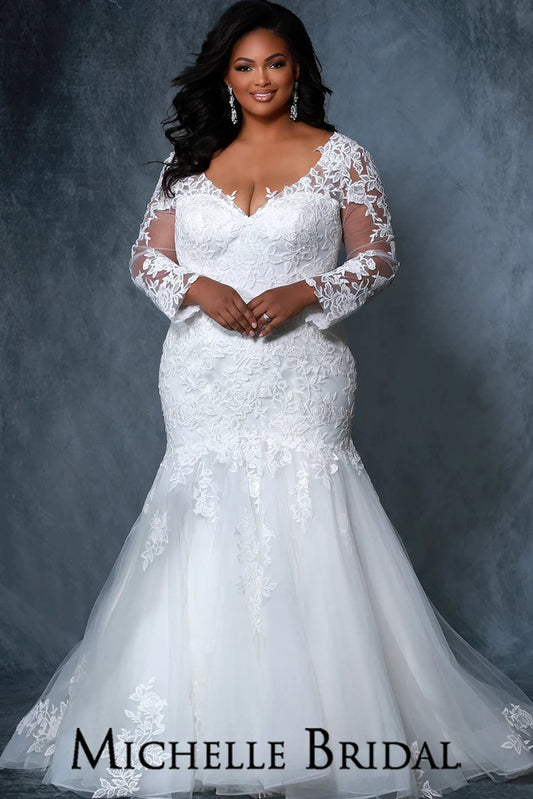 Michelle Bridal For Sydney's Closet MB2202 Fitted Silhouette V-Neck Sleeves With Appliques And Illusion Mesh Embroidered Lace With Tone On Tone Sequin Floral Appliques With Rose Pattern Plus Size "Bridgette" Bridal Gown. The sophisticated Michelle Bridal For Sydney's Closet MB2202 is a stunning plus size "Bridgette" bridal gown featuring a fitted silhouette with V-neck sleeves, appliques, and embroidered lace with sequin floral appliques and a rose pattern.