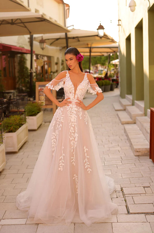 Amarra Bridal 84435 Morgan A-Line Ballgown Drape Lace Off The Shoulder Floral Train Wedding Gown. Morgan is a unique floral wedding dress for the free-spirited and non-traditional bride.