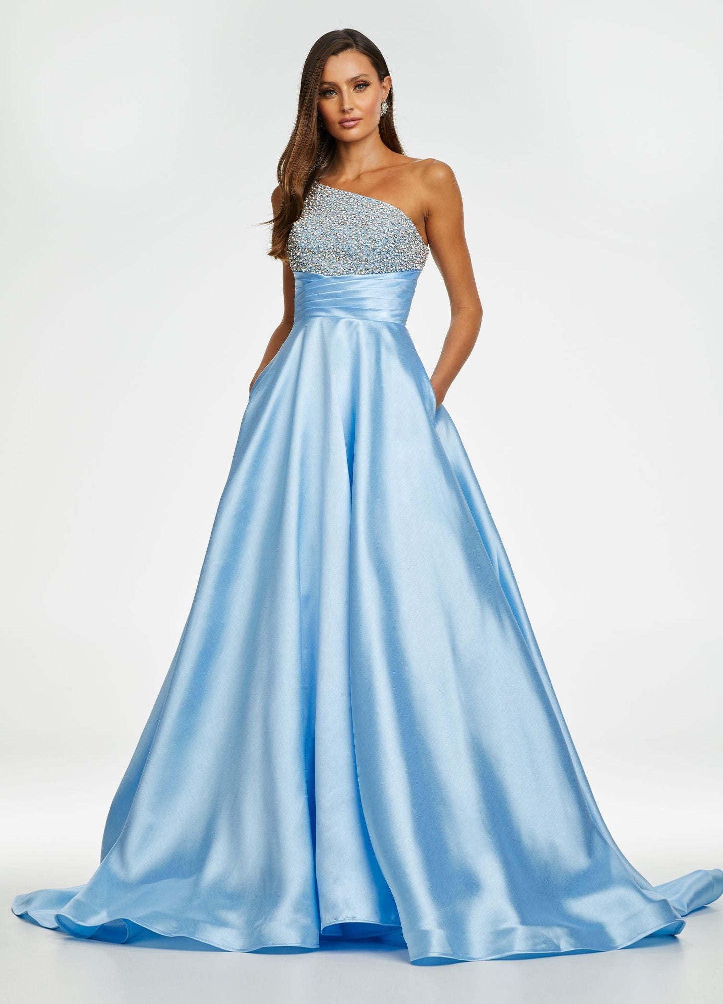 Ashley Lauren 11149 One Shoulder Ball Gown Prom Dress with Embellished Bodice  Sparkle in this one shoulder taffeta ball gown. The elegantly encrusted bustier is embellished with pearls and crystals that give way to wrap waistline. Did we mention is has pockets?!  One Shoulder Beaded Bustier Shimmer Taffeta Train Colors:  Sky, Aqua, Pink, White Sizes:  0-16