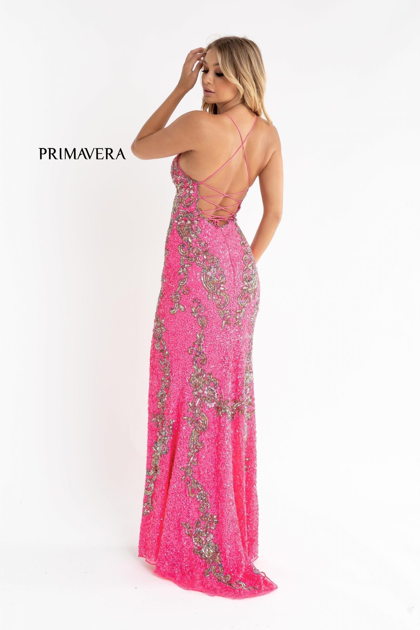 Primavera Couture 3211 is a Long fitted sequin Embellished Formal Evening Gown. This Prom Dress Features a deep V Neck with an open Corset lace up back. Beaded & embellished elegant scroll pattern accentuate curves. Fully beaded prom dress with floral pattern and side slit. Long Sequin Gown featuring a v neckline. slit in the fitted skirt, Slit in Thigh. Stunning Pageant Dress, Prom Gown & More!