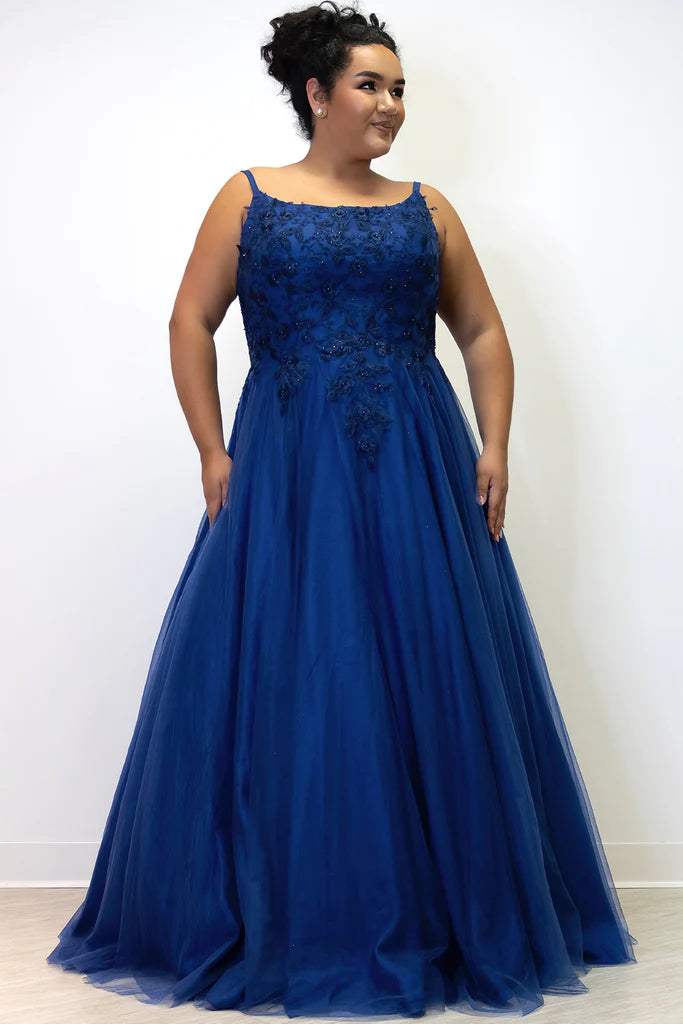 Sydney's Closet SC7357 A-Line Scoop Neck Tulle Lace Appliques Plus Size Prom Dress.  You'll be the belle of the ball in Sydney's Closet SC7357 A-Line Prom Dress! Flattering A-line skirt with scoop neck and lace appliques make you look like a real star. Get ready to dazzle in this plus size stunner! #HollaIfYouHeardItHereFirst