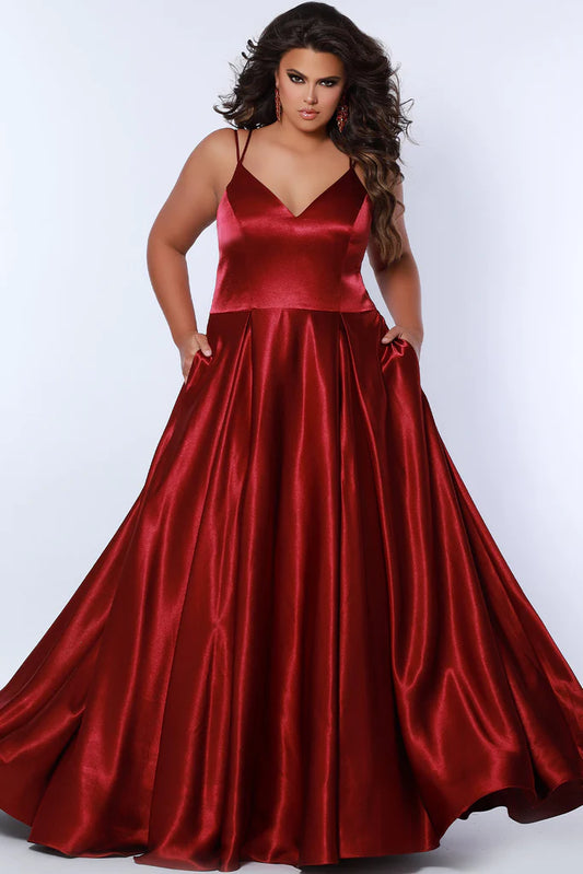 Sydney's Closet SC7363 Satin A-Line Silhouette With Pockets Sweetheart Neckline Spaghetti Strap Plus Size Prom Dress. For all your prom dreams, the Sydney's Closet SC7363 is where it's at! This show-stopping satin dress features a sweetheart neckline, spaghetti straps, and A-line silhouette with handy pockets. Plus-size perfection for any special event! Dare to dazzle!