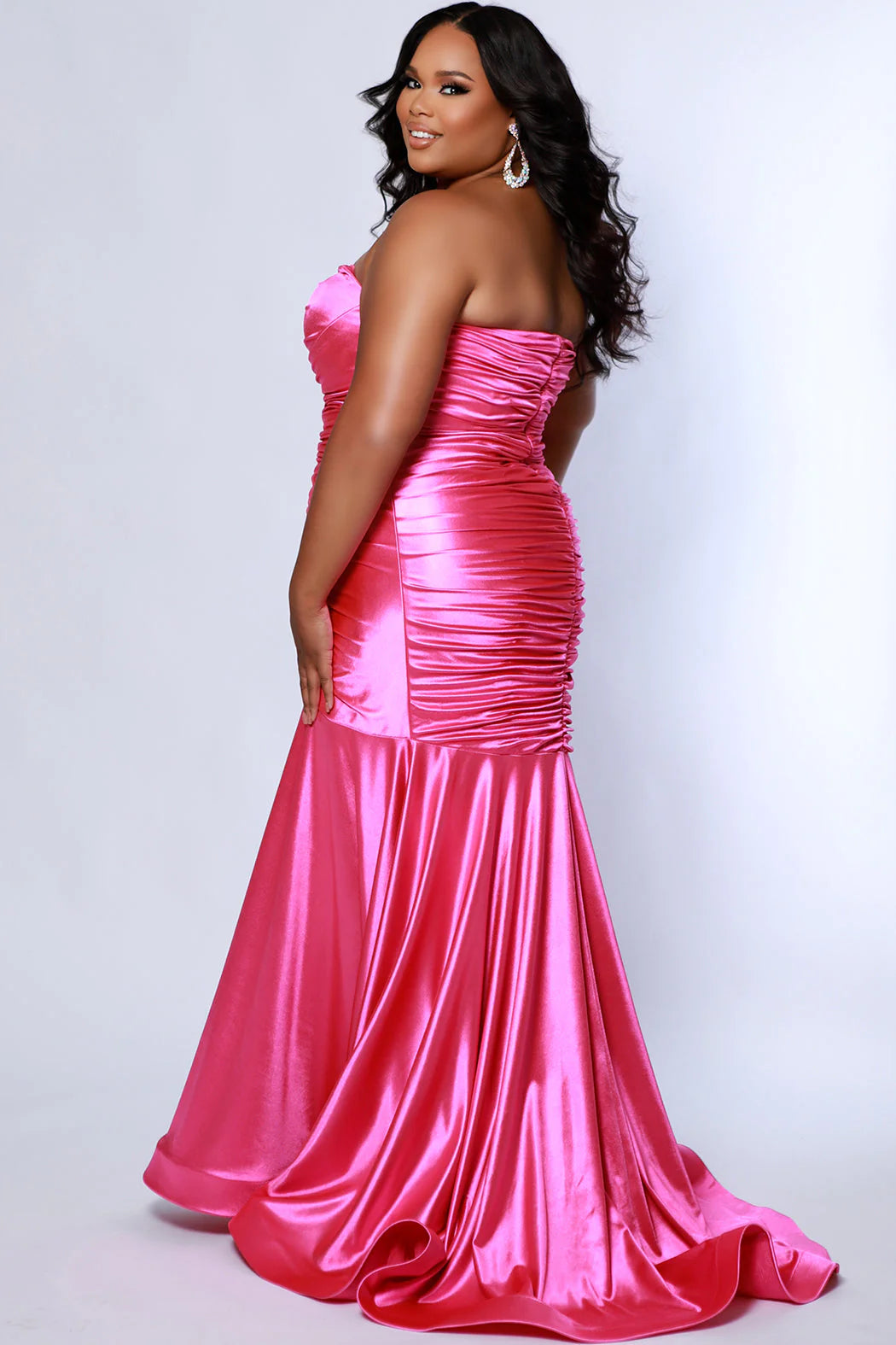 This elegant mermaid dress by Sydneys Closet SC7364 features a fitted sweetheart bodice top and a ruched satin skirt with a long, floor-length train. With a timeless strapless design, this prom dress is perfect for a formal occasion. Our curve-hugging long formal dress lets you look glamorous and make a trendy fashion statement at Prom or any elegant evening event coming up on your social calendar.