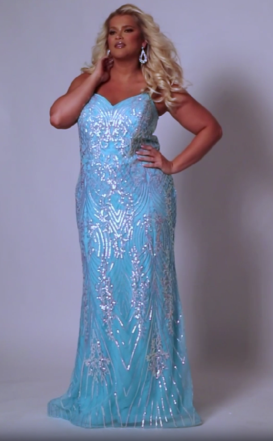 Look beautiful and timeless in this Sydneys Closet SC7366 Long Prom Dress. The fitted plus size gown is embellished with dazzling sequins and a graceful train. Perfect for your next formal event, this elegant dress is sure to make you the bright star of the night. Look glamorous on your big night in this sexy fitted Trumpet gown.