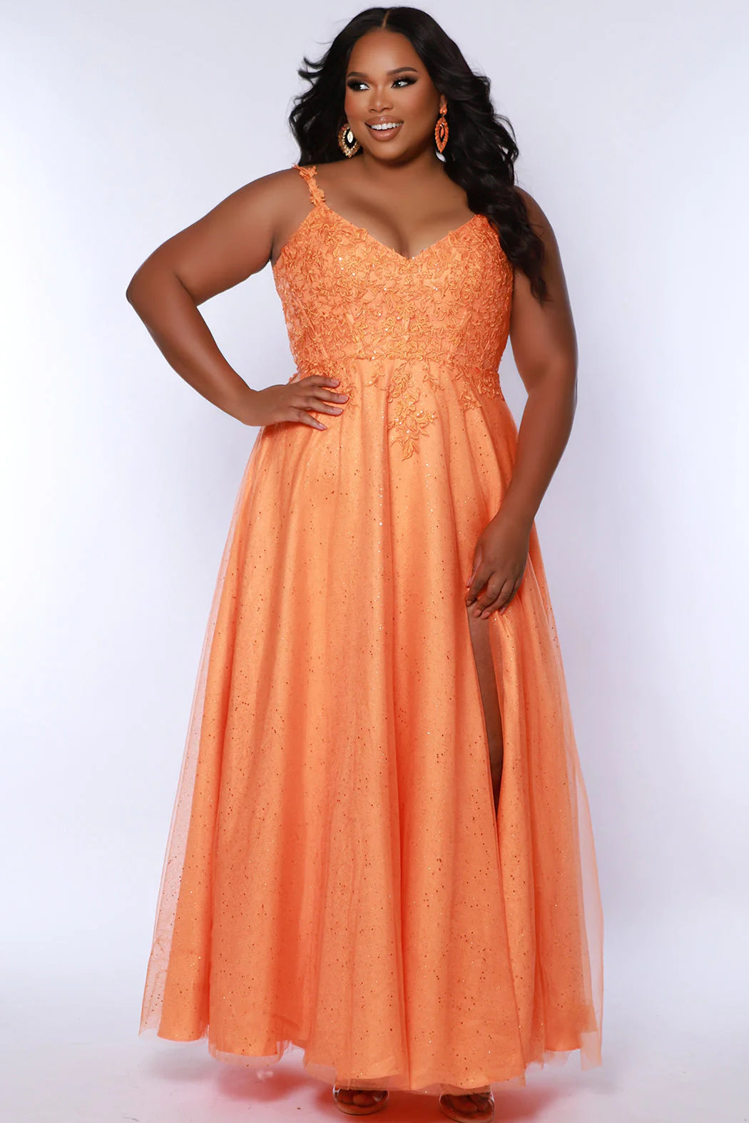 Look stunning at any formal event in a Sydneys Closet SC7384 Long Prom Dress. This A-line prom gown features a V-neckline with a scoop back, slit, pockets and a floor-length skirt complete the look. Ideal for plus size formal occasions. Pump up the fun factor at Prom 2024 when you arrive wearing this sparkly Aline evening dress. 