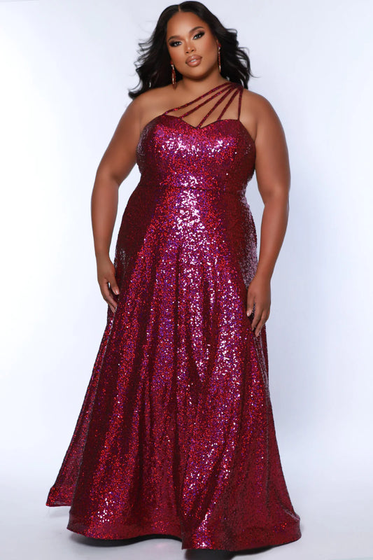 Elevate your look in Sydneys Closet SC7389 Long Prom Dress. This plus size sequin gown features an off-shoulder neckline, A-line silhouette, and pockets for added convenience. Perfect for formal occasions, this dress ensures you'll make a stunning entrance. Be the glamour Queen at Prom 2024 or any formal gala when you sparkle in our 1-shoulder sequin plus size evening dress. 