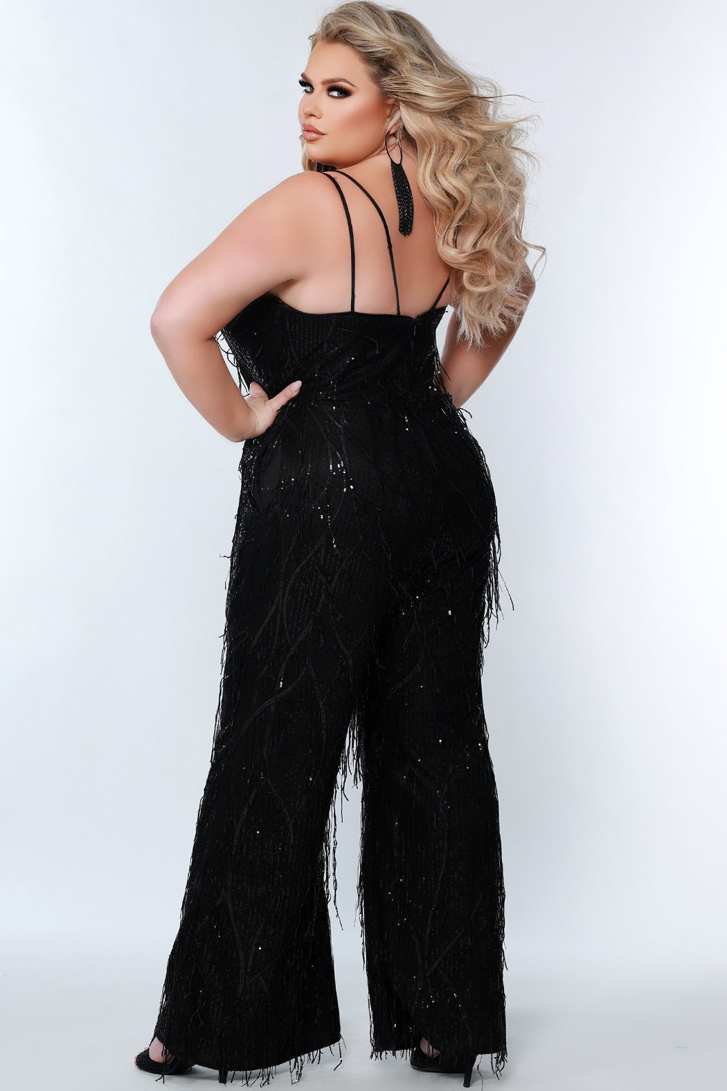 Sydney's Closet SC9104 Long Black Sequin Fringe Plus Size Formal Jumpsuit Pockets "RAVEN" Color: Black Size: 14-28 Sequin fringe Jumpsuit Double spaghetti straps covered in sequins V-neckline Pockets Natural waistline Wide leg pant