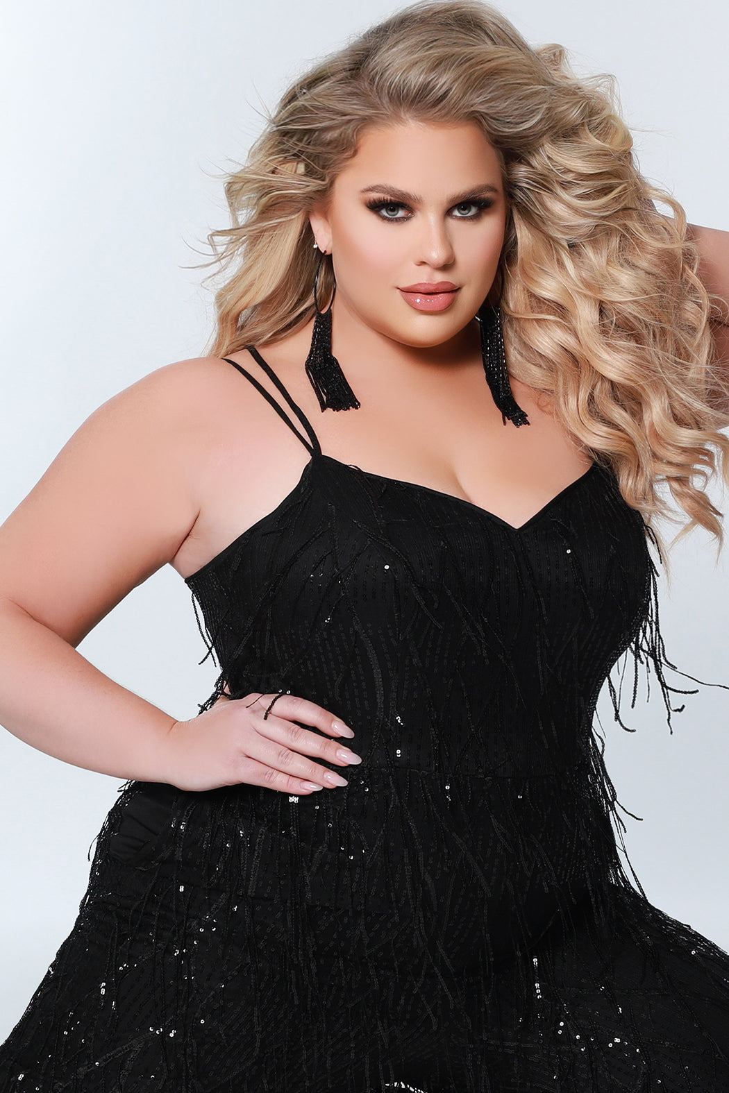 Sydney's Closet SC9104 Long Black Sequin Fringe Plus Size Formal Jumpsuit Pockets "RAVEN" Color: Black Size: 14-28 Sequin fringe Jumpsuit Double spaghetti straps covered in sequins V-neckline Pockets Natural waistline Wide leg pant