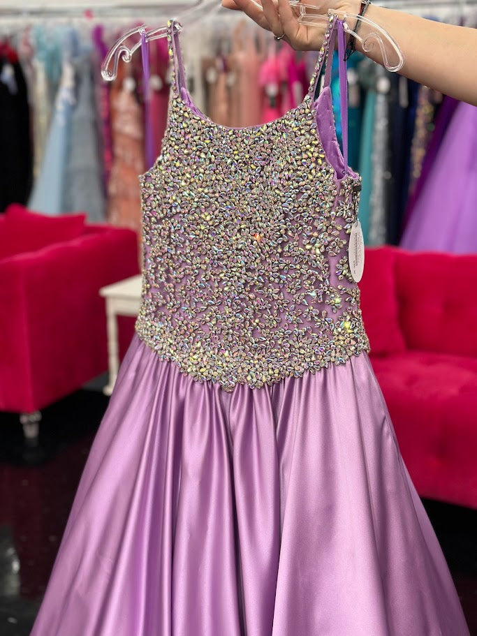 <p>Sugar Kayne C134 by Johnathan Kayne Girls and Preteens long pageant gown with stone encrusted bodice with and embellished spaghetti straps.&nbsp; The full ballgown skirt is made of Duchess Satin and has a sweeping train.&nbsp;</p> <p>Available colors:&nbsp; Orchid</p> <p>Available sizes:&nbsp; 12</p>