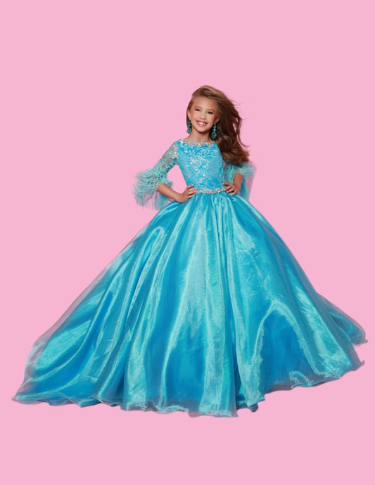 The Sugar Kayne C338 Preteen Pageant Dress is an elegant A-line ballgown featuring sequin and feather sleeves. Featuring the highest quality materials, this dress is perfect for special occasions and is sure to make your child feel like a princess. Experience twinkling elegance in this Metallic Organza Ballgown. The feathered sleeves are designed to make you feel like royalty.