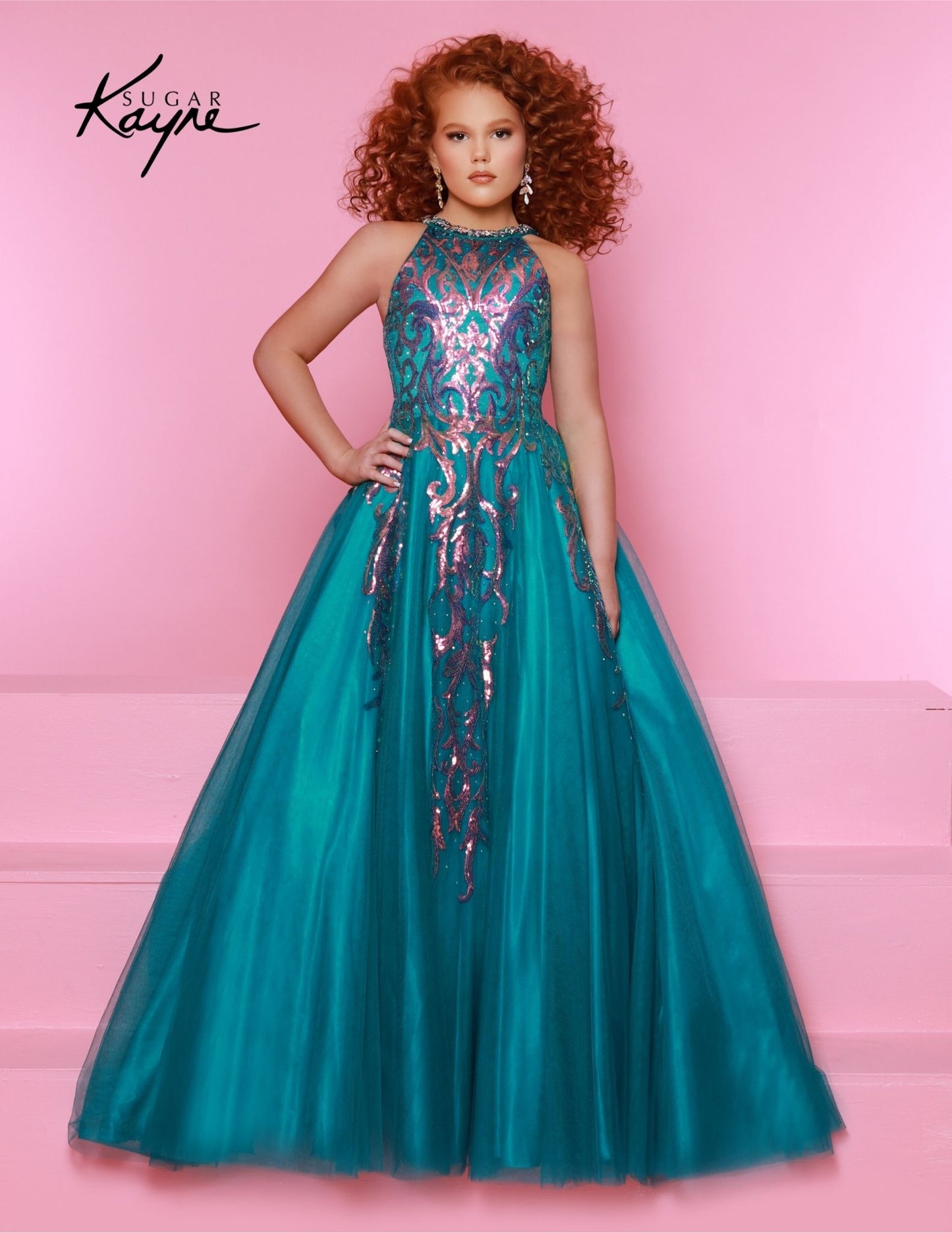 This Sugar Kayne C344 Preteen Pageant Dress is the perfect choice for any special occasion. The dress features a halter neckline, a glittering sequin bodice, and an A-line skirt. Its classic design and streamlined silhouette bring a timeless elegance to any event. Glittering Grace! This Sequin Mesh Ballgown and halter-style neckline ensure you will captivate the audience with grace and style!