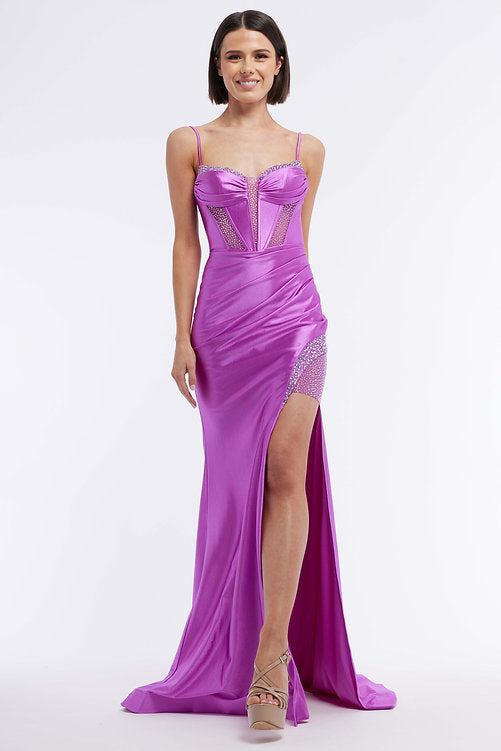 The Vienna Prom 7960 is an elegant evening gown featuring a long satin skirt, ruched bustier corset, and a dazzling crystal bodice – the perfect look for any pageant or formal occasion. The maxi slit design gives a subtle hint of sexiness that won't overpower the sophistication of this classic silhouette.