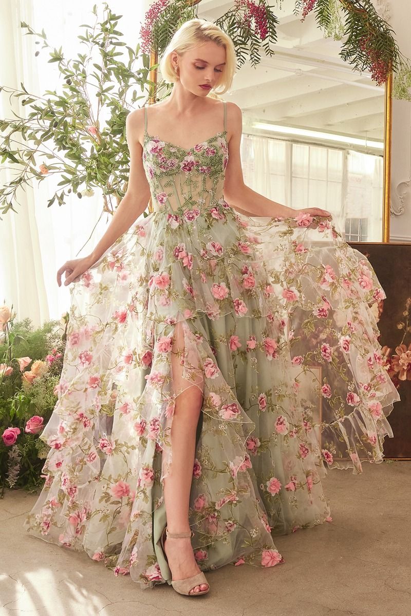 This stunning Andrea &amp; Leo Couture A1420 dress features a beautiful ruffle A-line design with a sheer corset top for a flattering silhouette. The layered floral print adds a touch of elegance to this prom dress. Feel confident and chic in this must-have gown. This enchanting A-line gown features a sweetheart neckline, delicate thin straps, and a sheer structured bodice adorned with floral prints. Crafted from layered organza, the ruffle skirt cascades gracefully, creating a romantic and flowy silhouette