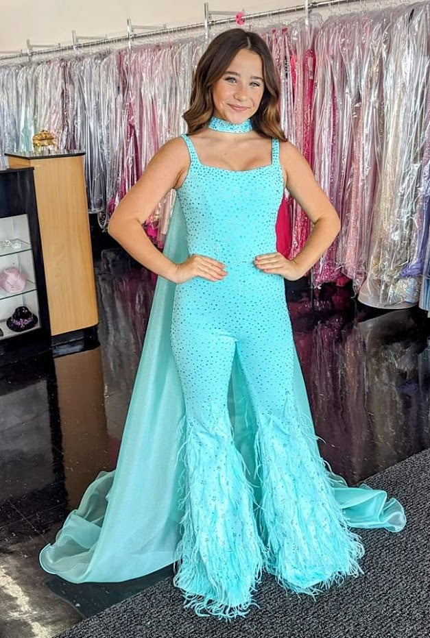 Ashley Lauren Kids 8210 Long Girls Pageant Jumpsuit with Crystal embellishements and a scoop neckline. Feather Embellished flared Bell Bottoms with a choker embellished with crystals and organza Cape.  Sizes: 4-16  Colors: Aqua, Fuchsia