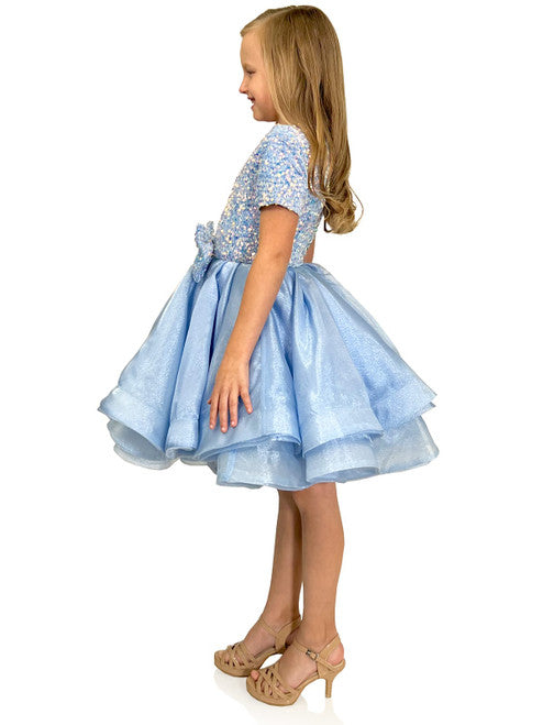 The Marc Defang 5105 Short Layered Organza Girls Dress Velvet Sequin Bow Pageant Wear is perfect for dressy occasions. Made of high-quality organza and featuring a soft velvet bodice and a sparkling sequin bow, it offers a stylish and comfortable look for your little one. With multiple layers of tulle and a lightweight fit, she'll be sure to make a statement at any event. Baby   Sizes: 12M, 2T, 4,5,6,7,8,9,10,11,12  Colors:  Baby Pink, Light Blue, Mint