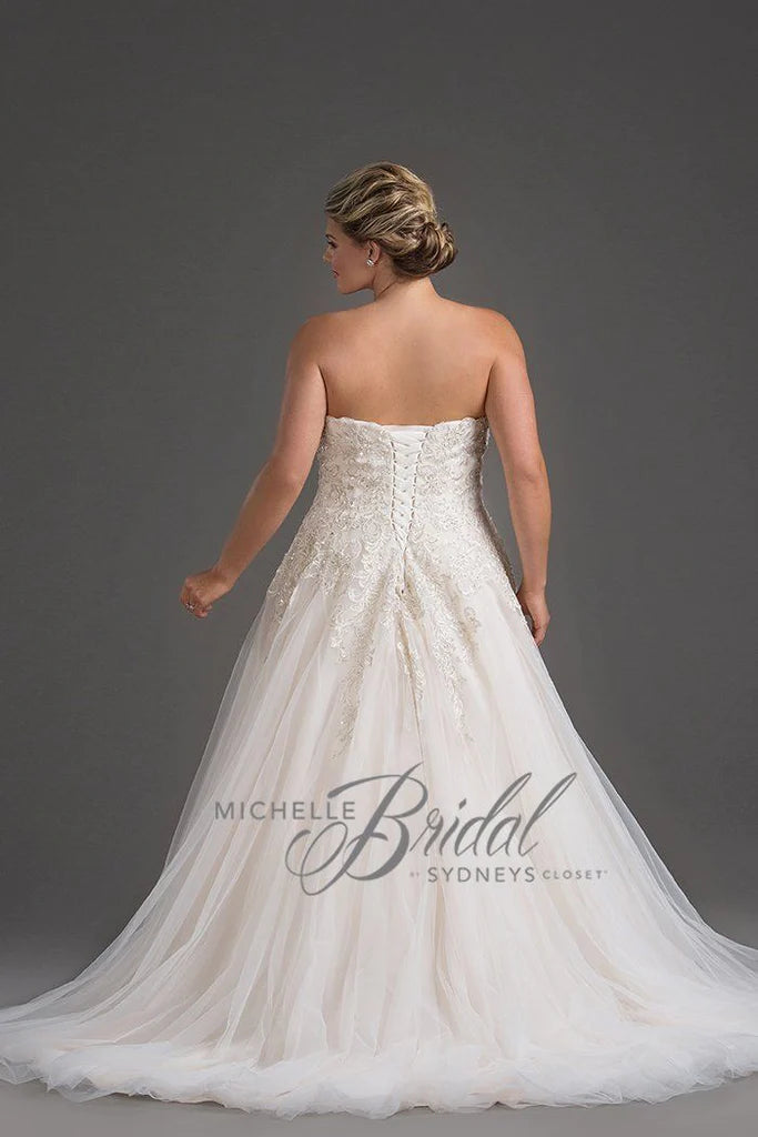 Michelle Bridal For Sydney's Closet MB1819 A-Line Sweetheart Neckline Strapless Lace Up Back Heavily Beaded Bodice Plus Size "Vanessa" Bridal Gown. Impress your guests on your special day with the luxurious Vanessa bridal gown from Michelle Bridal for Sydney's Closet. Crafted with a sweetheart neckline and a heavily beaded bodice, this strapless A-line gown also features a stylish lace-up back. Make a lasting impression in this plus size dress.