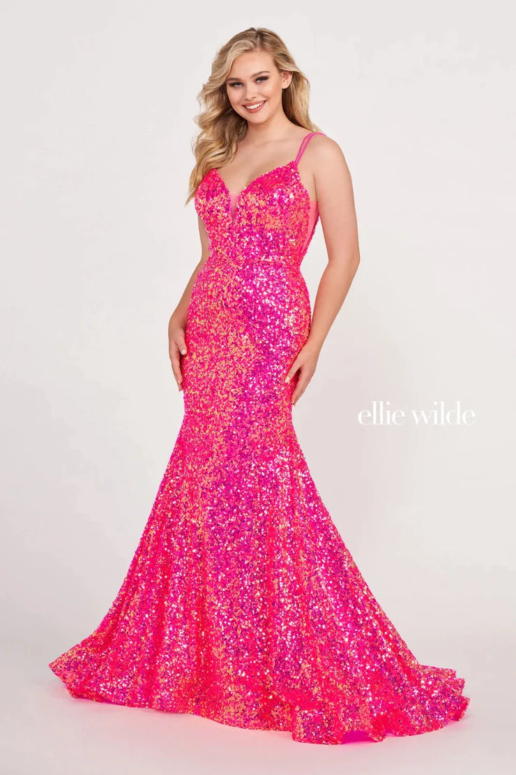 Look sophisticated and graceful in Ellie Wilde EW34016. The signature Iridescent color shifting sequins and mermaid silhouette make this timeless corset dress a perfect choice for a formal occasion. Captivate everyone in the room with its sparkling iridescent material and backless v-neckline.  Sizes: 00-20  Colors: ORANGE, LIGHT BLUE, HOT PINK, IRIS, FOREST LIGHT, PURPLE RAIN  https://dy9ihb9itgy3g.cloudfront.net/static/themes/EllieWilde/Spring_2023/EW34016.mp4