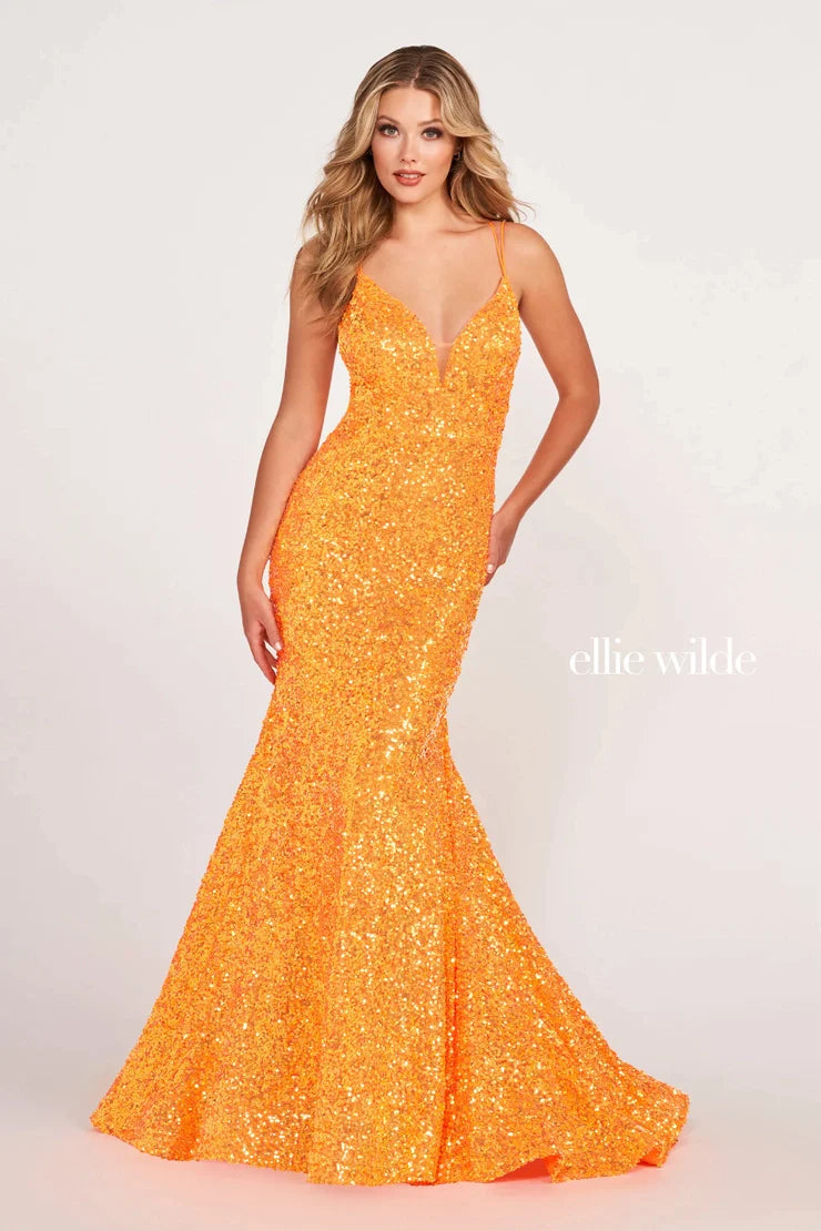 Look sophisticated and graceful in Ellie Wilde EW34016. The signature Iridescent color shifting sequins and mermaid silhouette make this timeless corset dress a perfect choice for a formal occasion. Captivate everyone in the room with its sparkling iridescent material and backless v-neckline.  Sizes: 16  Colors: FOREST LIGHT  https://dy9ihb9itgy3g.cloudfront.net/static/themes/EllieWilde/Spring_2023/EW34016.mp4