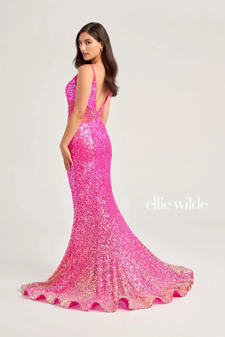 This Ellie Wilde Sequin Mermaid Sheer Prom Dress is perfect for your next special occasion. With its stunning beaded V neck and sheer detailing, this dress will make you stand out in the crowd. Its form-fitting silhouette and sparkling sequin design will make you feel confident and elegant. Ombre  Sizes: 00-16  Colors: OCEAN BLUE, HOT PINK