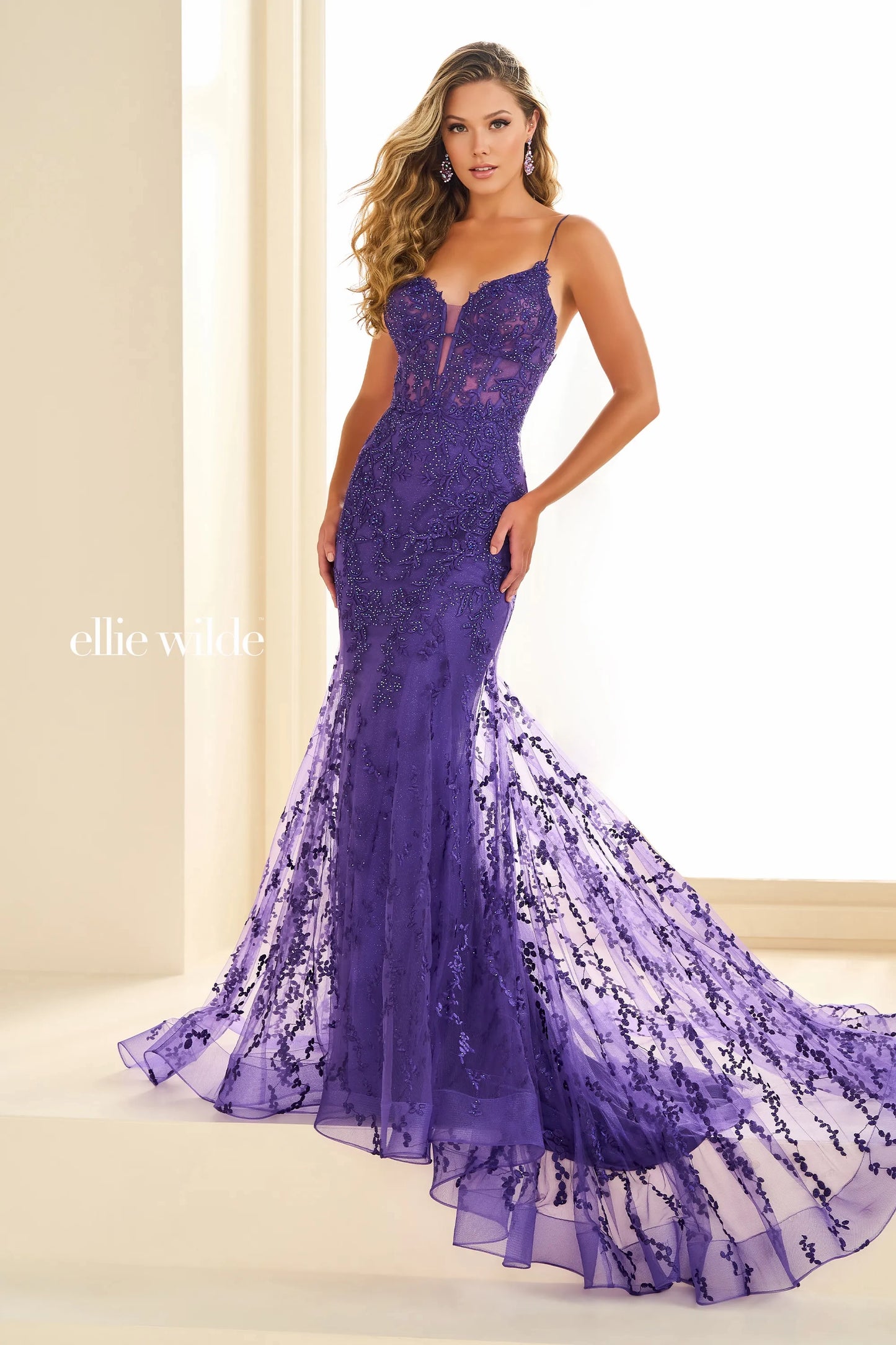 Expertly designed by Ellie Wilde, the EW36009 Long Sheer Lace Corset Prom Dress is the ultimate choice for any formal occasion. Featuring a stunning mermaid silhouette and delicate lace detailing, this gown is sure to turn heads. The corset bodice offers a flattering fit, making you feel confident and beautiful all night long. Perfect for prom, pageants, or any special event, this dress is a must-have for any fashion-forward individual.