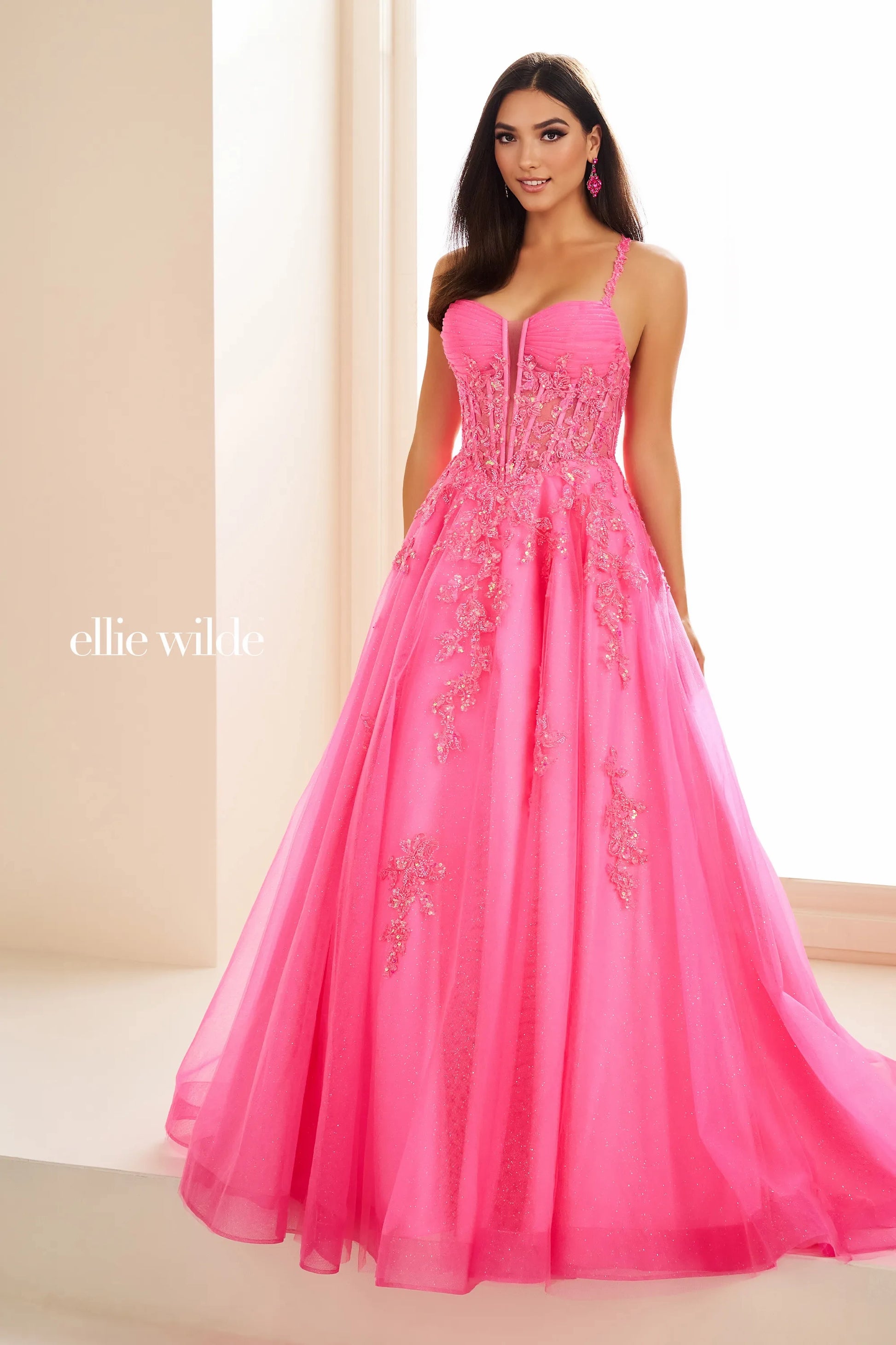 Unleash your inner glamour with the Ellie Wilde EW36202 Prom Dress. Made with shimmering sequin lace and a sheer corset, this dress is designed to make you stand out. The elegant ball gown silhouette and formal design will ensure you feel confident and sophisticated for any formal occasion.