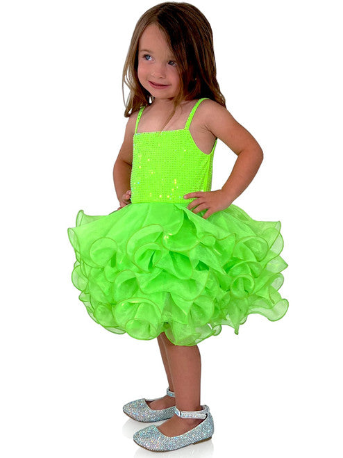 Enjoy dazzling elegance with Marc Defang 5144 Short Crystal Cupcake Pageant Dress. Showcasing gorgeous shimmer organza layered ruffle cupcake skirt, this dress is sure to make your little one feel like a royalty. Perfect for any special occasion, this beautiful gown is ideal for your baby or kids.  Sizes: 0M, 6M, 12M, 18M, 2T, 3T, 4T, 5T, 6T  Colors: Neon Green, Neon Pink