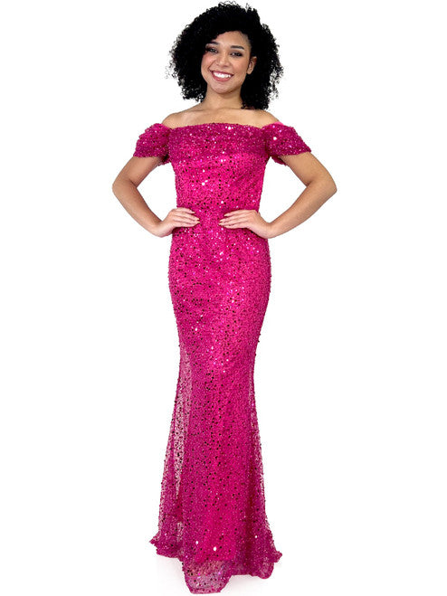 This Marc Defang 8228 dress is an elegant, fitted off-the-shoulder design, featuring a detachable overskirt and ornate pearl, sequin, and beaded detailing. It's perfect for a unique prom, pageant, or wedding look. Corset back  Sizes: 00-16  Colors: Hot Pink, White  *Allow 30 days production