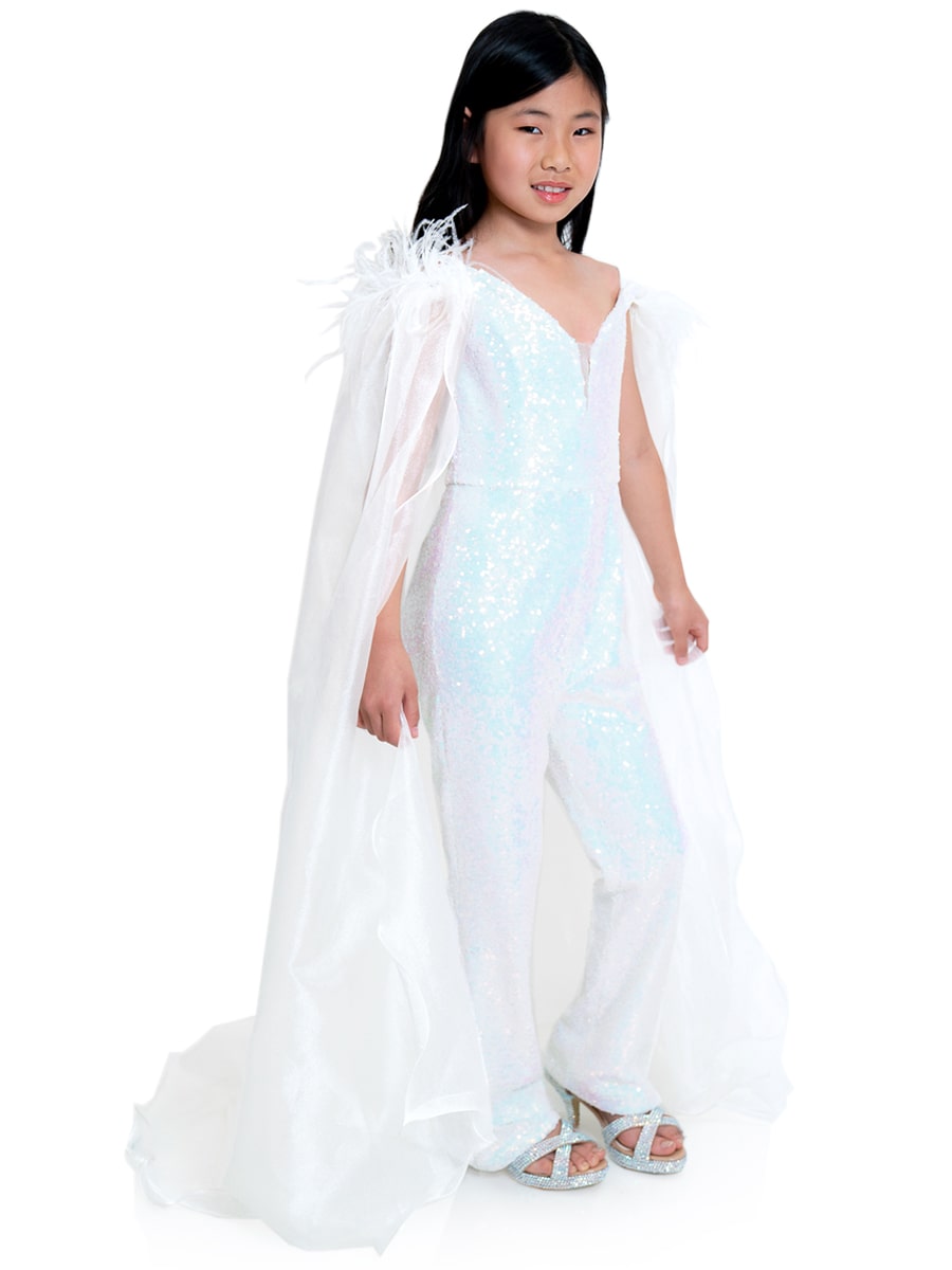 Marc Defang 8099K is a KIDS long pageant formal wear jumpsuit that is made of sequins and has off the shoulder straps.  The straps are attached to a cape with feathers at the shoulders.  Wow the crowd at your next pageant.  Available colors:  Pink, Turquoise, White, Black, Royal