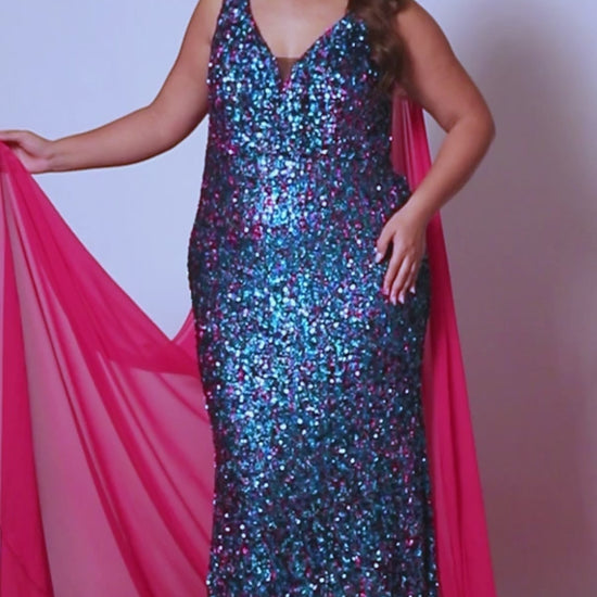 This Sydneys Closet JK2407 Long Fitted Plus Size Sequin Cape Pageant Dress Formal Gown is perfect for formal occasions. Crafted from high-quality materials, this dress features stunning sequin detailing, a long cape-style skirt, and a fitted silhouette, making it a sophisticated choice for any event. With its stylish and timeless design, this gown is sure to make a lasting impression. 