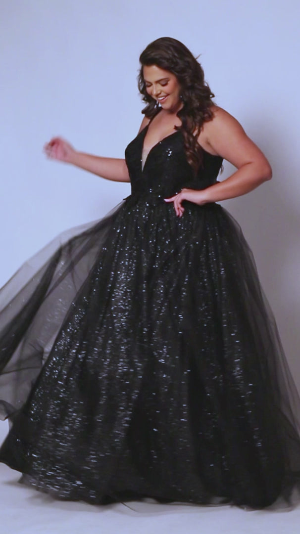 This plus-size evening gown from Sydneys Closet features a glamorous sequin-encrusted bodice, a V-neckline, and an A-line skirt for a modern, flattering silhouette. Crafted from luxurious fabrics, this formal gown is perfect for special occasions. 